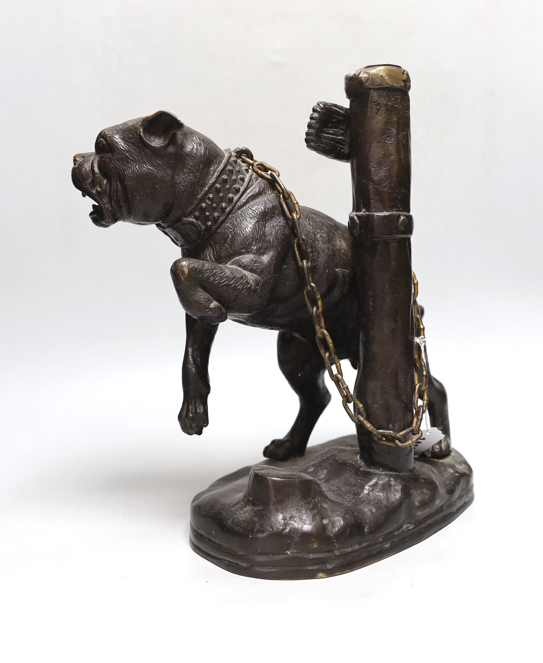 After Mene. A bronze of a pit bull dog chained to a post, 33cm high